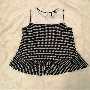 Navy and white polka dot sleeveless top